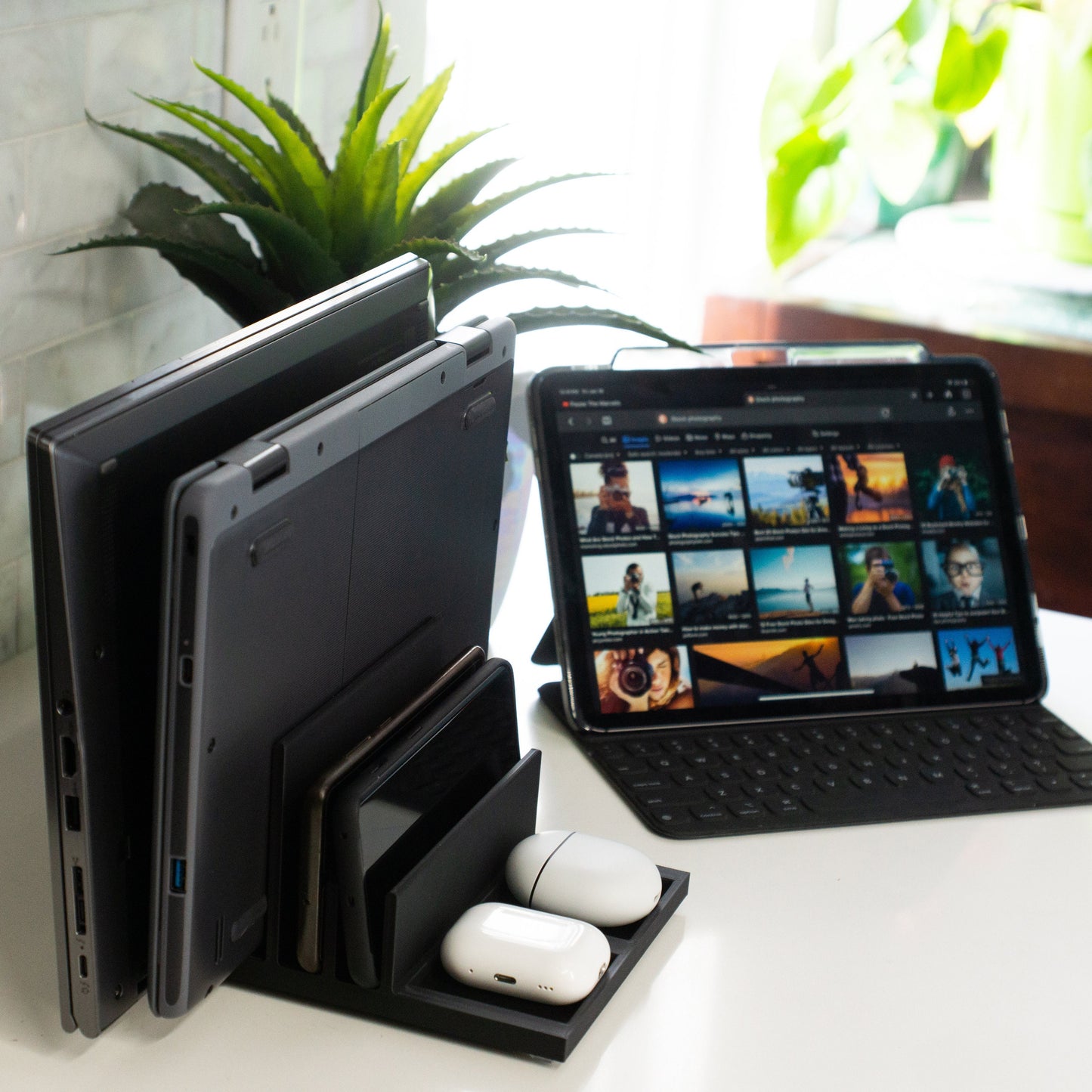 Multi-device stand, perfect for vertically organizing laptops, tablets, phones etc.