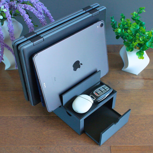 Multiple mobile device Family charging station with 4 slots and front tray, 2 thin laptops slots and 2 slots for  tablets, phones etc. We designed our docking stations with reinforced back and rubber footing to ensure the devices are held securely.