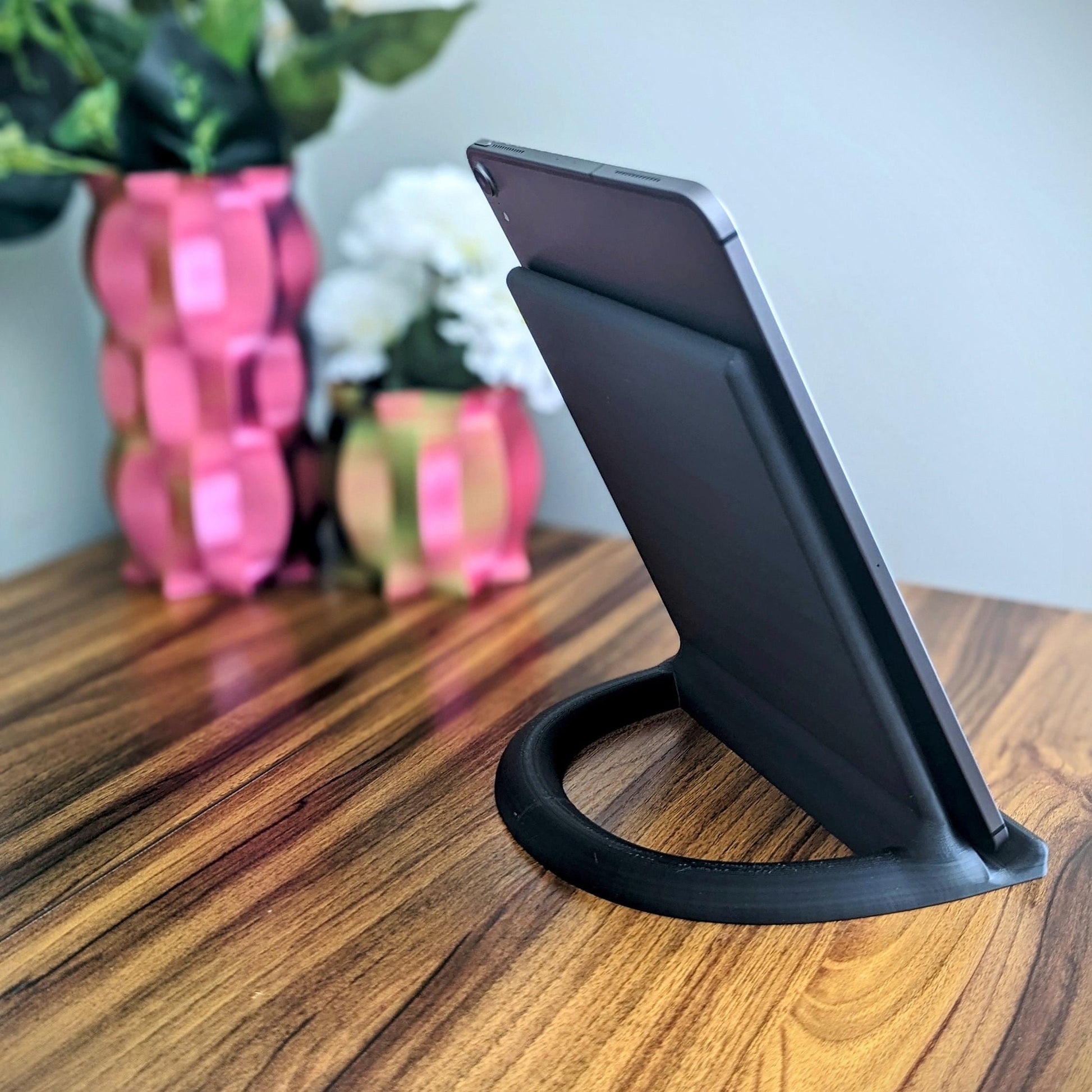 Minimalist tablet stand ideal for all tablets (Ipad, Samsung, Acer, etc.). Alternatively it could be a great addition to your kitchen for displaying cook books.