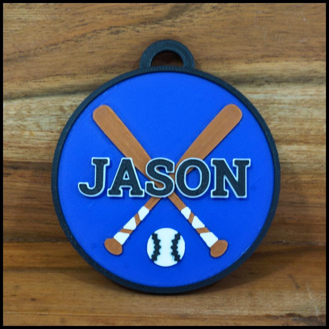 Personalized / customized double sided name tag, bag tag or keychain. Up to four colors for any team or color combo.