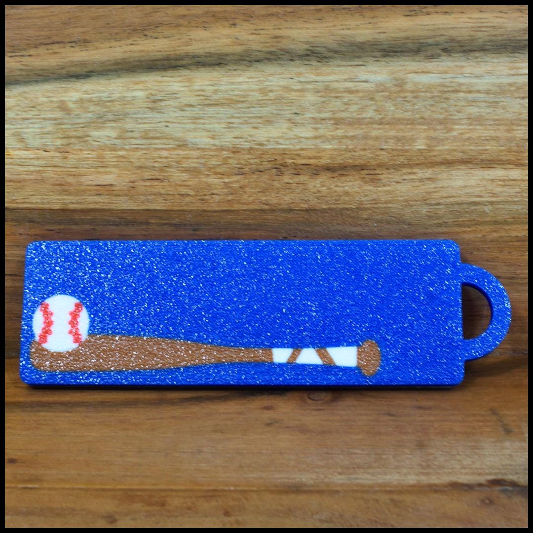 Personalized / customized double sided name tag, bag tag or keychain. Up to four colors for any team or color combo.