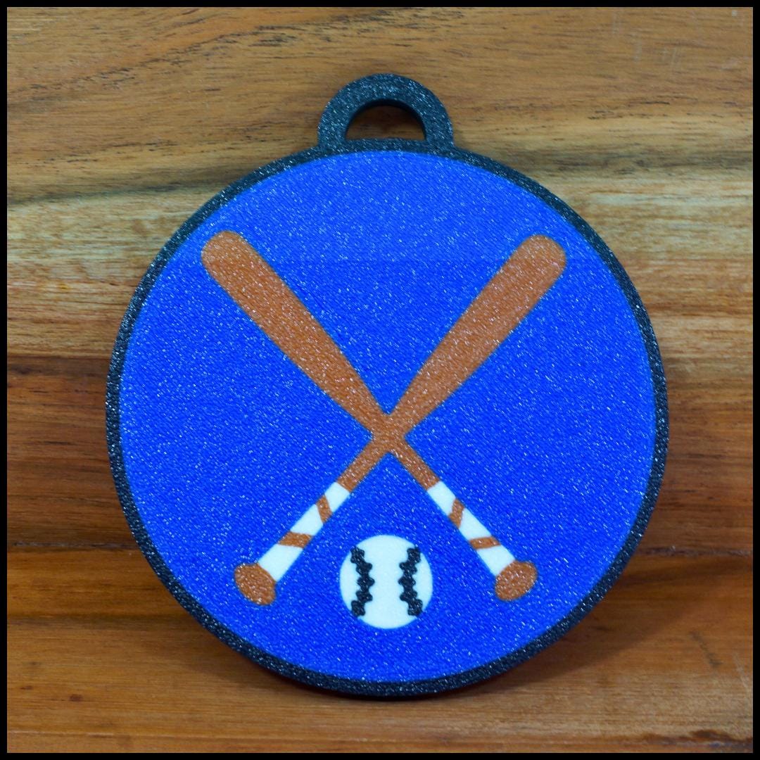 Personalized / customized double sided name tag, bag tag or keychain. Up to four colors for any team or color combo.